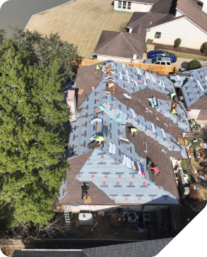 Roofers fixing homeowner’s roof.