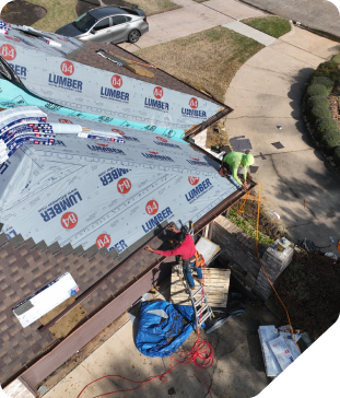 Residential roofer installing shingle tile roof.