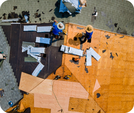 Roofers installing new residential roof.