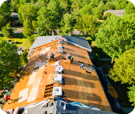 Roofers installing new residential roof.